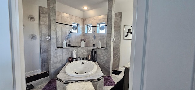 bathroom with tile patterned flooring and independent shower and bath