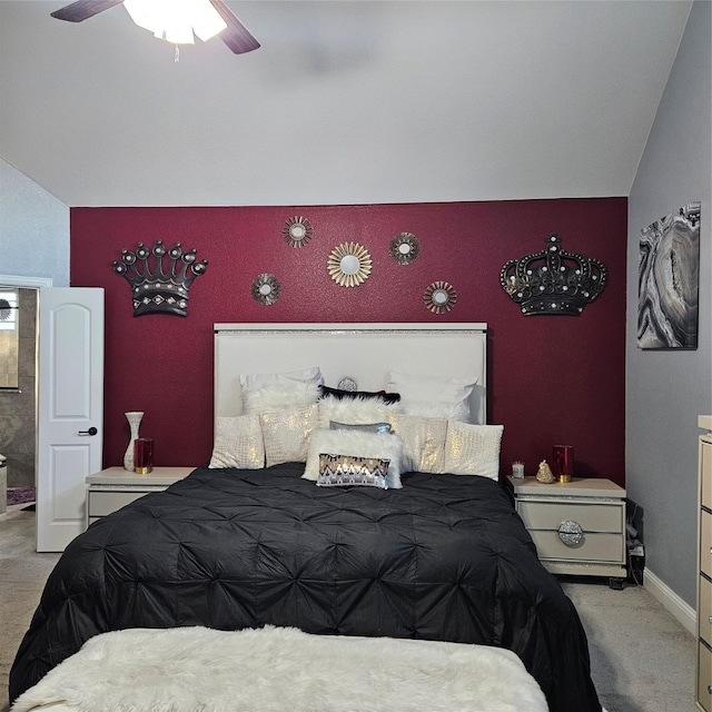 bedroom with light carpet, ceiling fan, and lofted ceiling