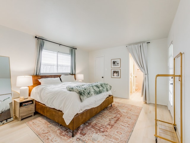 bedroom featuring light wood-type flooring