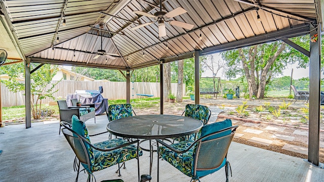 view of patio / terrace featuring a gazebo and ceiling fan