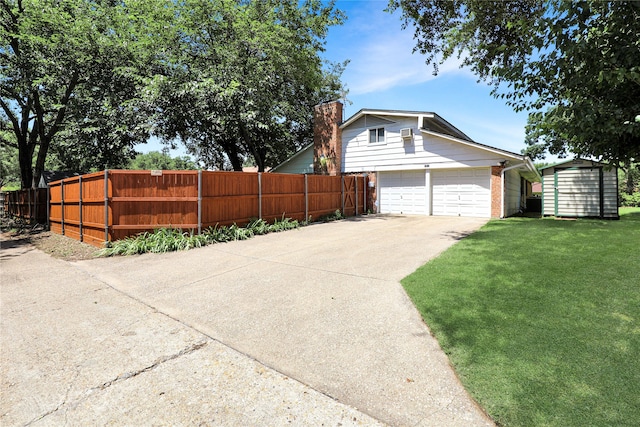 garage featuring a yard