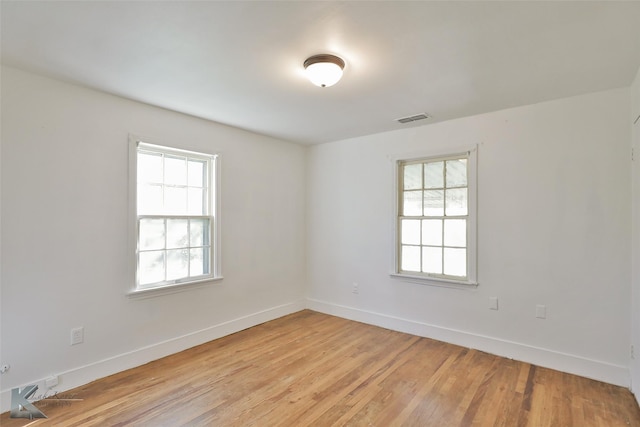 2909 Poplar St, Abilene, TX 79602 - spare room with light wood-type flooring and baseboards
