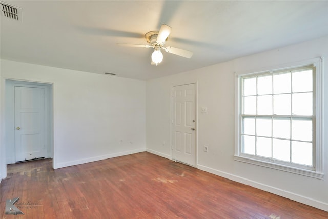 2909 Poplar St, Abilene, TX 79602 - unfurnished room featuring ceiling fan, wood finished floors, baseboards, and plenty of natural light
