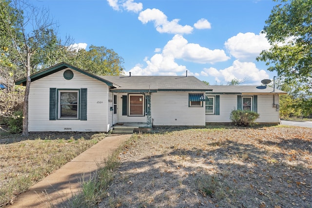 ranch-style house with a front yard