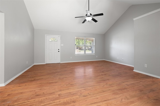 unfurnished living room featuring ceiling fan, light hardwood / wood-style floors, and lofted ceiling