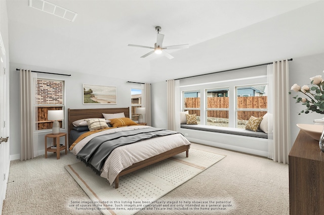 carpeted bedroom with ceiling fan