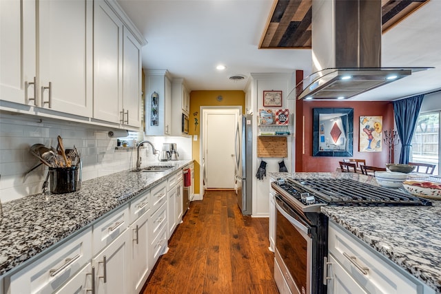 kitchen featuring ventilation hood, stainless steel appliances, sink, white cabinets, and dark hardwood / wood-style floors