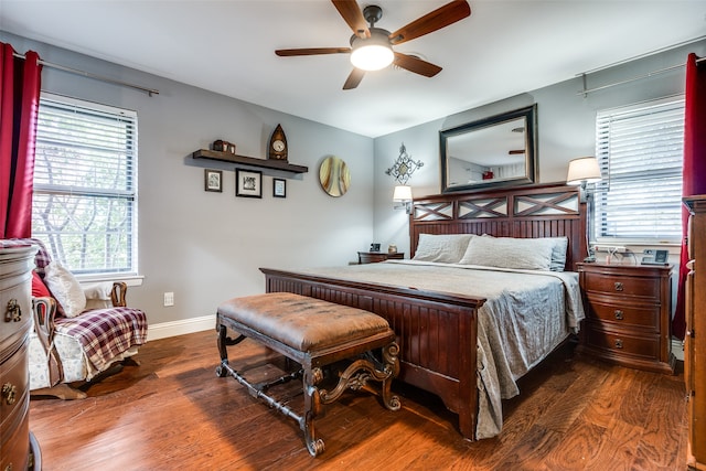 bedroom with hardwood / wood-style flooring and ceiling fan