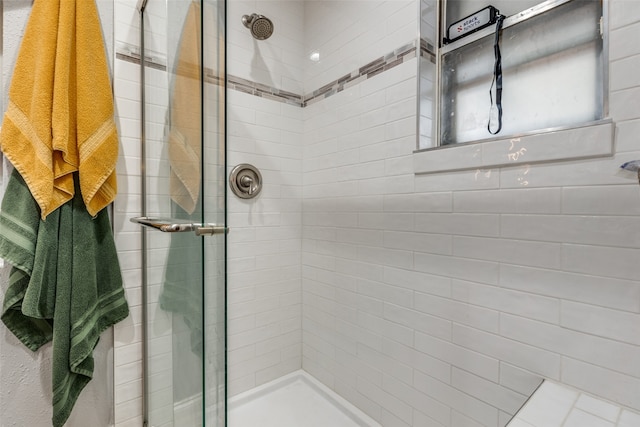 bathroom featuring walk in shower