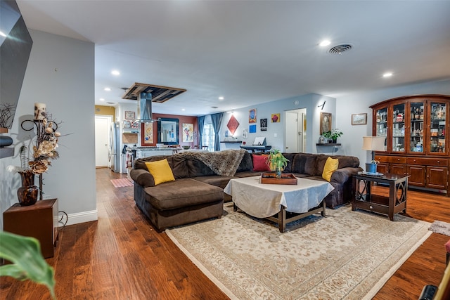 living room with hardwood / wood-style flooring