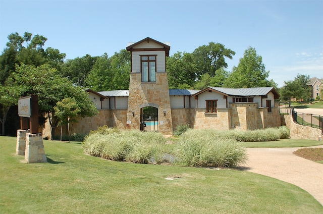 exterior space with a front lawn