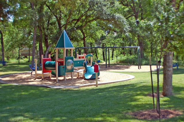 view of jungle gym with a lawn