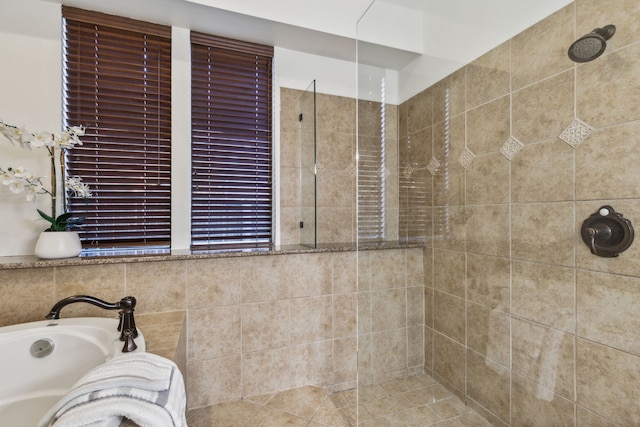 bathroom with independent shower and bath