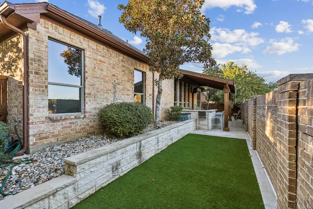 view of yard with a patio area