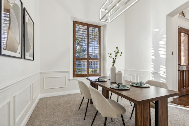 view of carpeted dining area