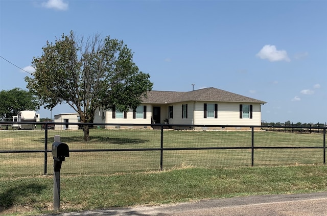 single story home featuring a front yard