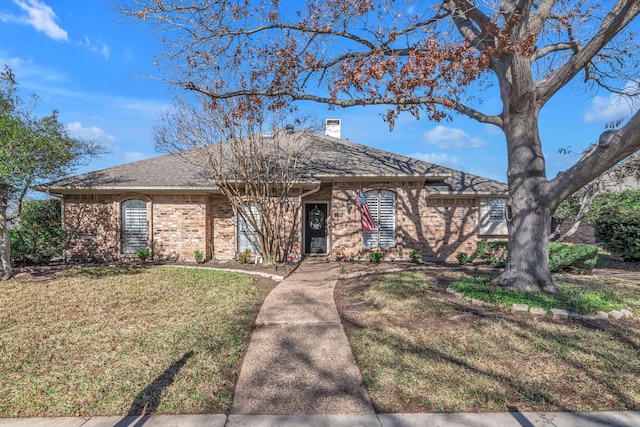 ranch-style house with a front lawn