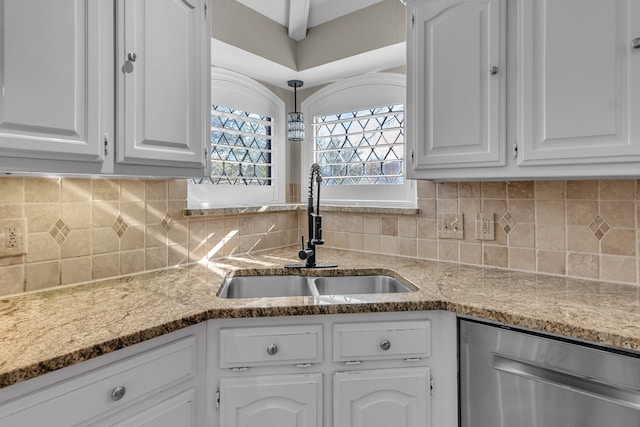 kitchen with sink, stainless steel dishwasher, and white cabinets