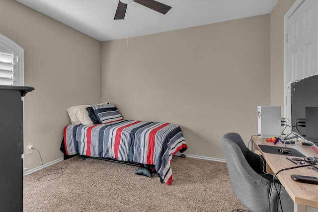 bedroom with ceiling fan and carpet