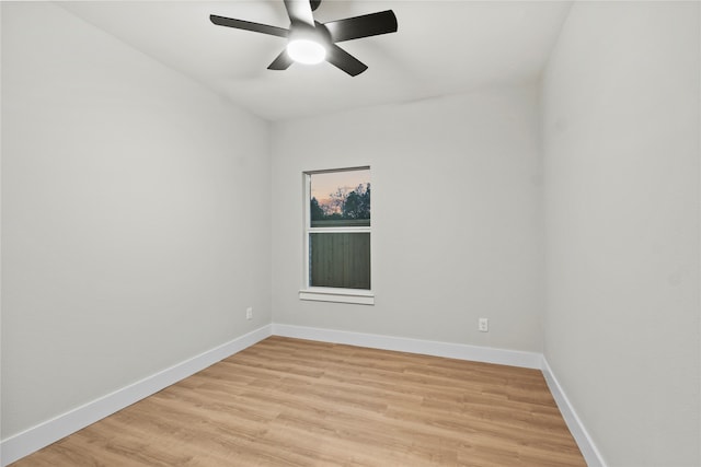 spare room with ceiling fan and light hardwood / wood-style flooring