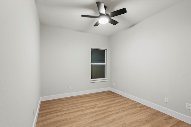 spare room featuring ceiling fan and light wood-type flooring