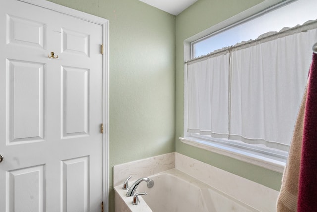 bathroom featuring a bathing tub