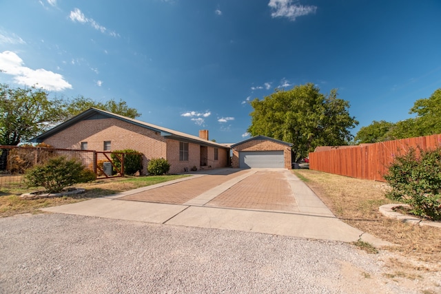 single story home featuring a garage