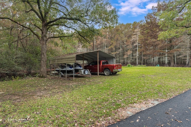 view of yard featuring a carport