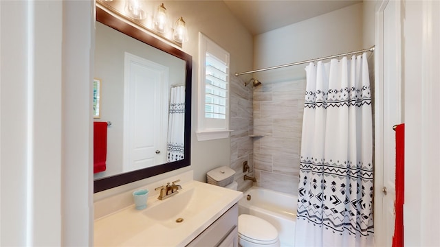 full bathroom featuring toilet, vanity, and shower / tub combo with curtain