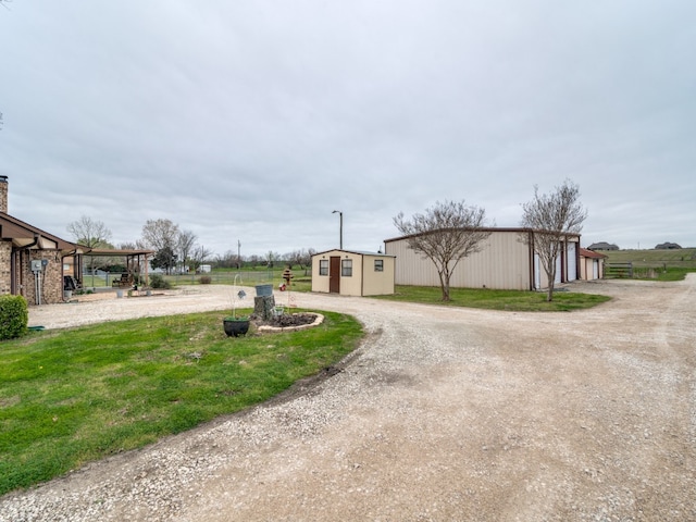 exterior space featuring an outbuilding