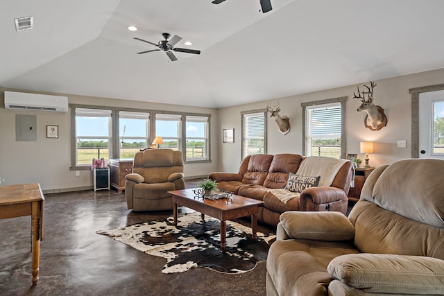 living room with a wall mounted air conditioner, vaulted ceiling, and a wealth of natural light