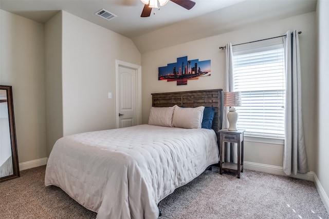 carpeted bedroom featuring ceiling fan and lofted ceiling