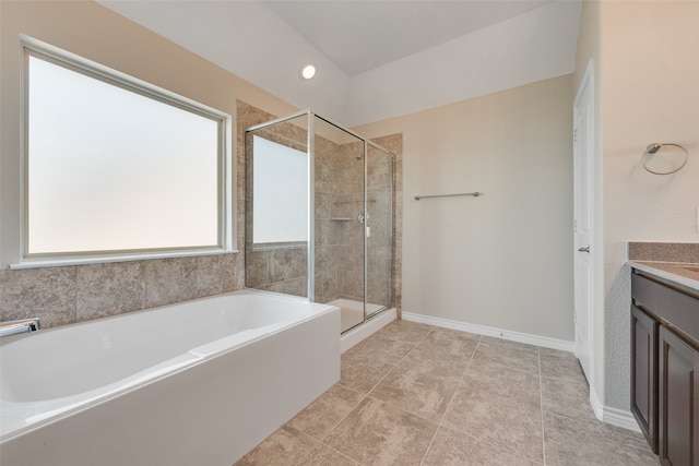 bathroom featuring tile patterned flooring, vanity, and independent shower and bath