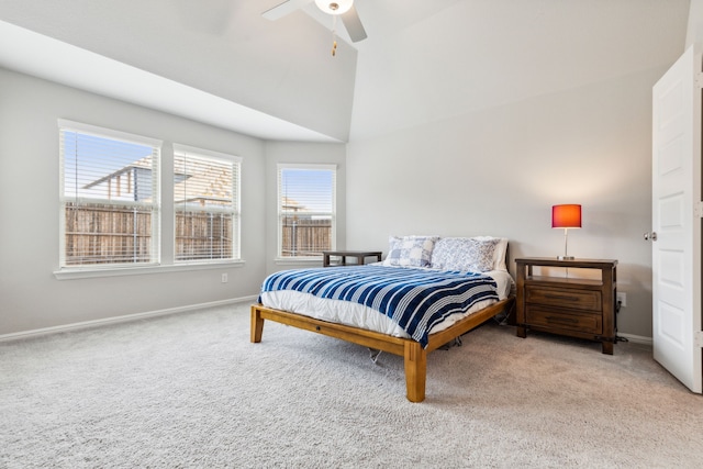 bedroom featuring carpet flooring, high vaulted ceiling, and ceiling fan