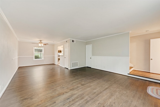 unfurnished living room with crown molding, dark hardwood / wood-style flooring, and ceiling fan