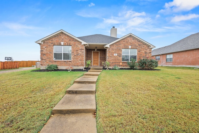 single story home featuring a front yard