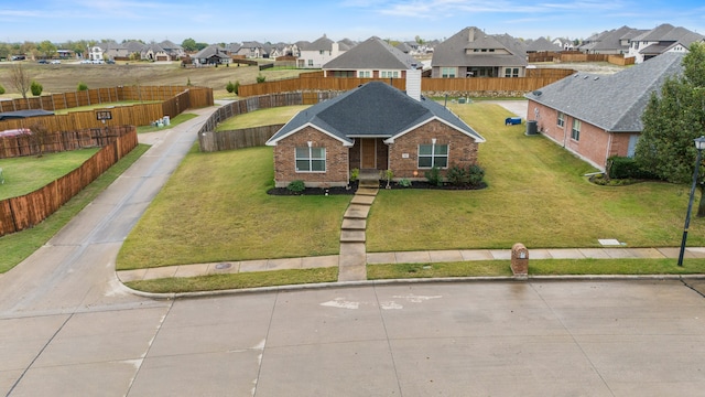 view of front of home featuring a front yard