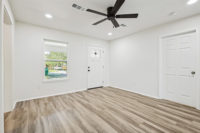 entryway with light hardwood / wood-style flooring and ceiling fan