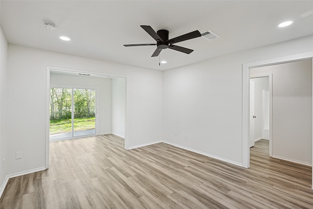 unfurnished room featuring light hardwood / wood-style floors and ceiling fan