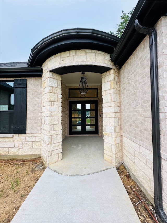 doorway to property with french doors