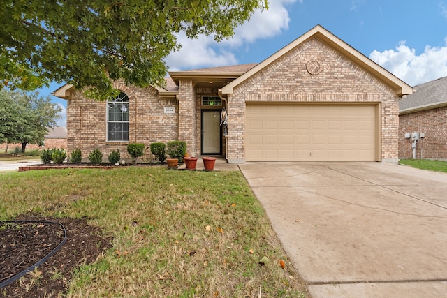 ranch-style home with a front yard and a garage