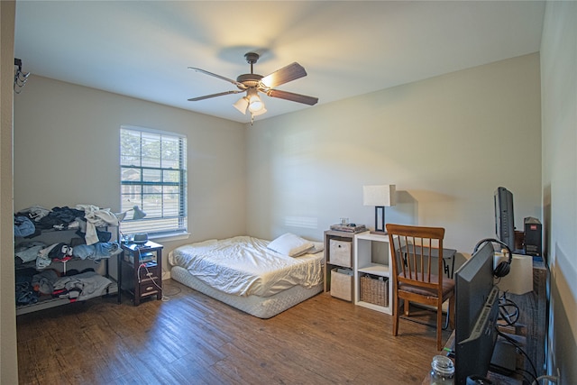 bedroom featuring wood-type flooring and ceiling fan