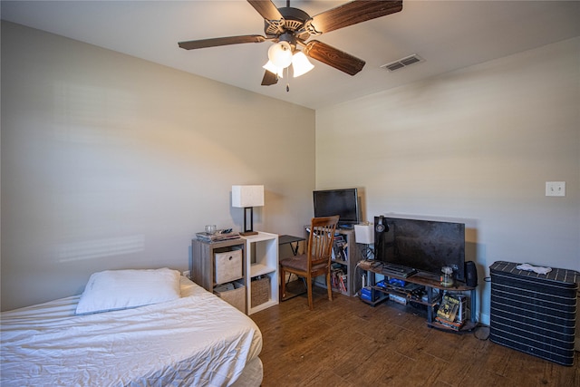 bedroom featuring wood-type flooring and ceiling fan