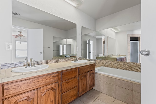 bathroom featuring separate shower and tub, ceiling fan, tile patterned flooring, and vanity