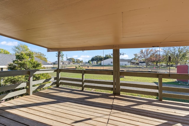 deck featuring a lawn