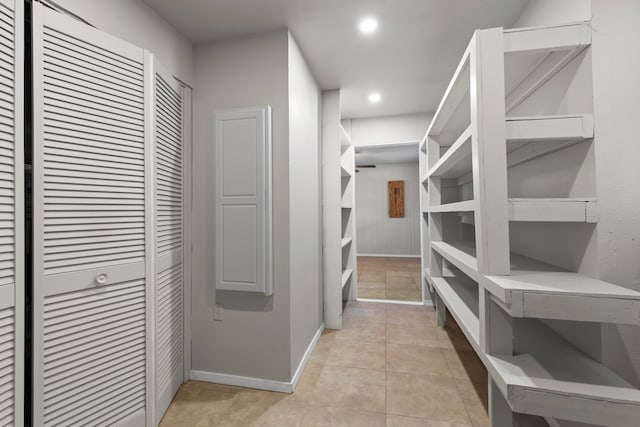 interior space with light tile patterned floors