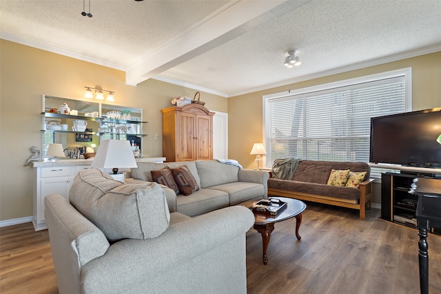 living room featuring beamed ceiling, hardwood / wood-style floors, a textured ceiling, and ornamental molding