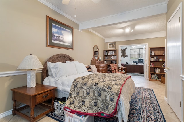 bedroom with ceiling fan, ornamental molding, a textured ceiling, and light tile patterned floors