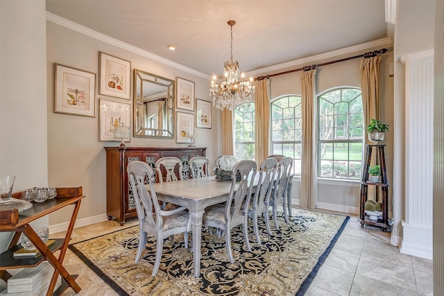 dining space featuring a notable chandelier and ornamental molding