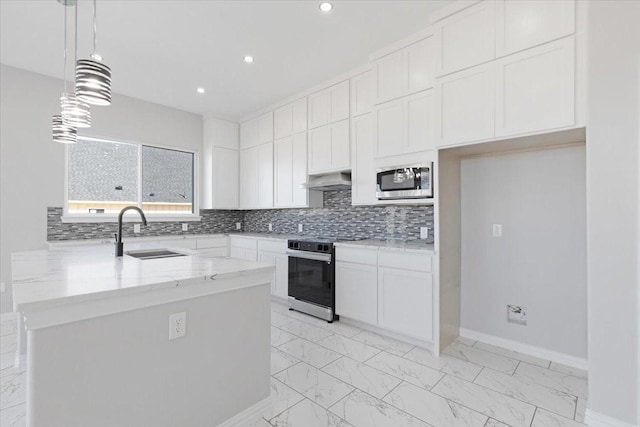 kitchen with white cabinetry, hanging light fixtures, electric stove, sink, and stainless steel microwave